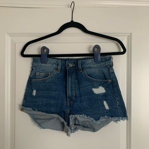 H&M distressed blue denim shorts, size US 4